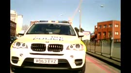 Police Car nearly crashes into the back of a car