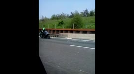 Funny Frog Man on M25 Motorway