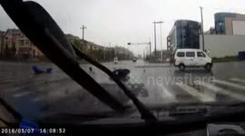 Electric bike driver escapes being run over by car