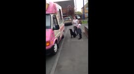 Reggie the Staffie dog enjoys a trip to the ice cream van