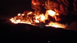 High quality footage of a major fire at a used tyre dump near Madrid, Spain