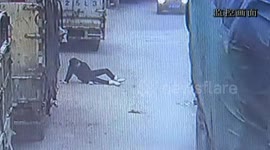 Scooter driver 'pretends' she was run over by a lorry, but gets caught on camera