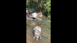Brave man rescues boy swept downstream in southwest China
