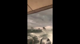 Tourists cling on during bouncy speedboat ride on choppy seas in Thailand