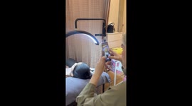 Calico cats join woman having beauty treatment