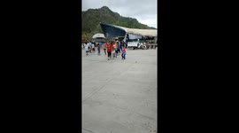 Gusts blow away tent roof at market in Thailand