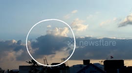 A dragon-shaped cloud spraying fire from its mouth was luckily captured by a photographer