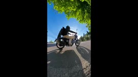 Motorcyclist's Camera Smashes Into Roadside Planter