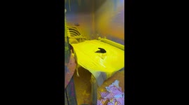 Manufacturer Paints Doll Heads