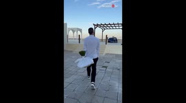 Seascape becomes the stage for a romantic proposal with flowers and a ring