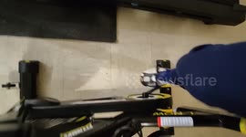 Biker and his feline friend team up for a heartwarming workout