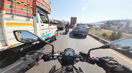 Car rear-ends motorcycle leading to near-fatal collision with truck