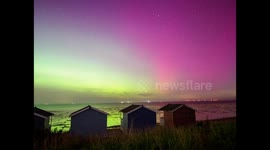 Spectacular display of the Northern Lights over Kent beach, UK