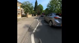 Lime bike being ridden  recklessly and dangerously through streets of South London