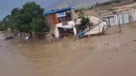 Flash flood footage from Baghlan province in Afghanistan shows mud water taking away things coming on its way