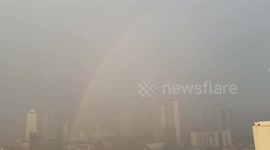 Double rainbow and heavy rains after a dangerous heat index in Philippines