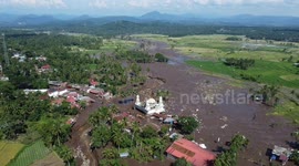 29 Died: Aftermath of cold lava flood from Mount Marapi in Indonesia An aerial view residents survey the devastated village, witnessing the aftermath of Mount Marapi's cold lava eruption, which ravaged homes, mosque, rice fields, vehicle and severed road
