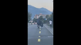Cyclist Carries Shelves on Bike