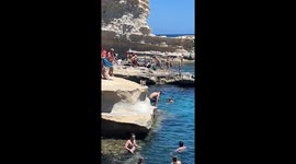 Dog Jumps To Swimming Owner's Arms