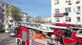 Romania: Fireman Frees Kitten Stuck In Tilted 4th Floor Window