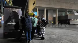 David Tennant and Georgia Tennant are surrounded by autograph collectors as they Depart the TV Bafta's