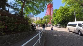Foreign tourists gather at a famous photo spot in Tokyo Tower, in Tokyo, Japan.
