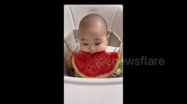 China: Baby Tries Watermelon for the First Time