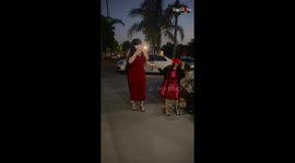 Little daughter witnesses her parents' unexpected proposal amidst a floral paradise