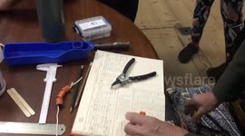 Peregrine chicks weighed in ice cream tubs after hatching at Worcester Cathedral