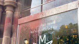 Protestors daub Manchester University in red paint