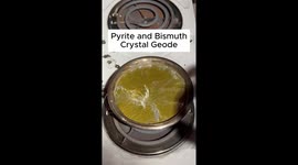A bismuth crystal geode is made with a piece of pyrite as a seed.