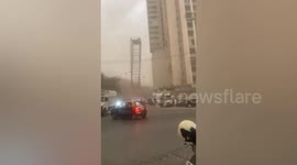 Mumbai storm blows over scaffolding