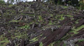 The Gunung Padang Pyramid Site In Indonesia  CIANJUR, INDONESIA - MAY 12: The Gunung Padang pyramid site in Cianjur, West Java, Indonesia, on May 12, 2024. Gunung Padang, also known as “mountain of enlightenment”, sits at the top of an extinct volcano and