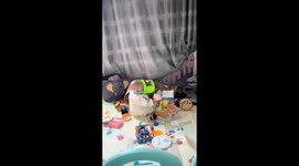 Baby rescued from toy bucket predicament in Jiangxi, China