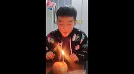Hilarious moment candle mysteriously reignites as Chinese boy dreams of becoming world's richest