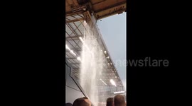 UK: Large Volume Of Rain Water Cascades Through Leaky Roof At Old Trafford Stadium
