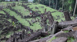 The Gunung Padang Pyramid Site In Indonesia  CIANJUR, INDONESIA - MAY 12: The Gunung Padang pyramid site in Cianjur, West Java, Indonesia, on May 12, 2024. Gunung Padang, also known as “mountain of enlightenment”, sits at the top of an extinct volcano and