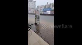 China: Lightning strikes near a person during rain