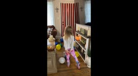 Little girl makes efforts to make dad's birthday a fizzy fiesta of fun