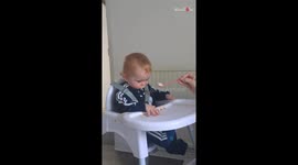 Adorable baby turns feeding time into a comedy routine for his brother