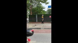 Mum calmly plays on phone while toddler throws tantrum