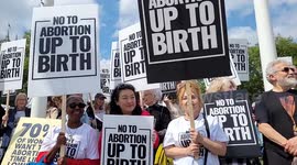 Protesters rally outside parliament demanding to lower abortion time limit