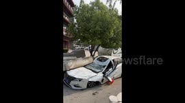 Powerful winds topple 2-tonne stone sculpture, crushing nearby car in China