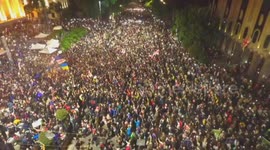 Drone video shows ministers of foreign affairs of Estonia, Iceland, Lithuania address protesters in front of Georgia parliament