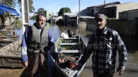 Brazilian Army and Fisherman Providing Support and Help to Flood Victims in Porto Alegre
