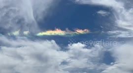 Colourful cloud appears in sky above Chinese city