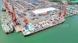 Chinese-made engineering vehicles exported to BRI partner countries leave Tianjin Port