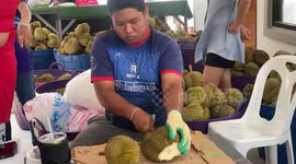 Shop sells pieces of durian fruit for one baht in Thailand
