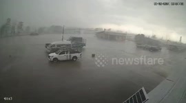 Storm flattens market roof leaving four stall holders trapped