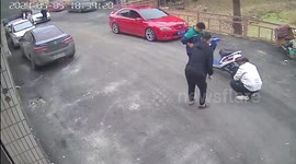 Rider loses control of his motorcycle when it surges forward